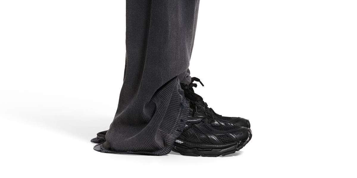 Balenciaga Sneakers a pair of Linda Farrow cat eye